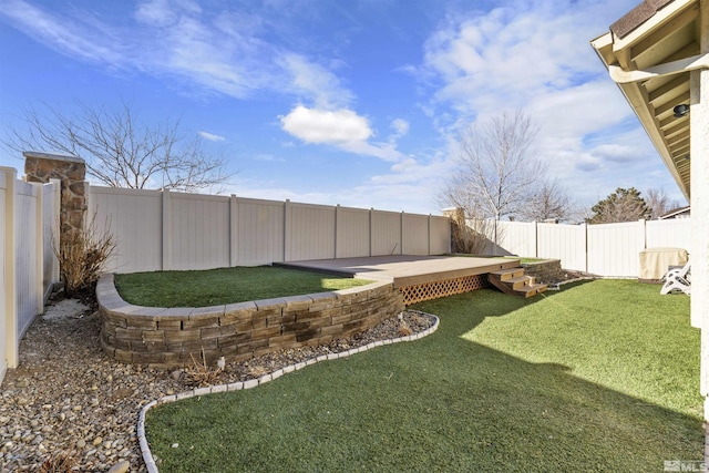 view of yard featuring a wooden deck