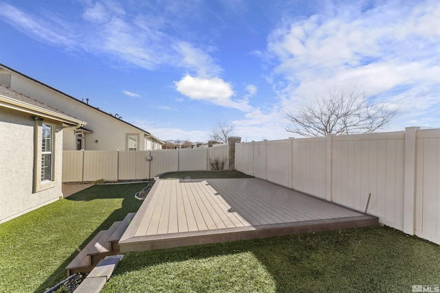 view of yard with a wooden deck