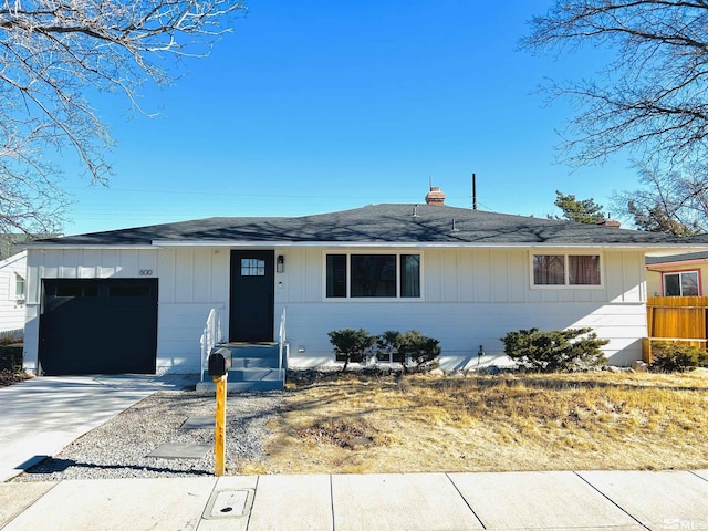 single story home with a garage