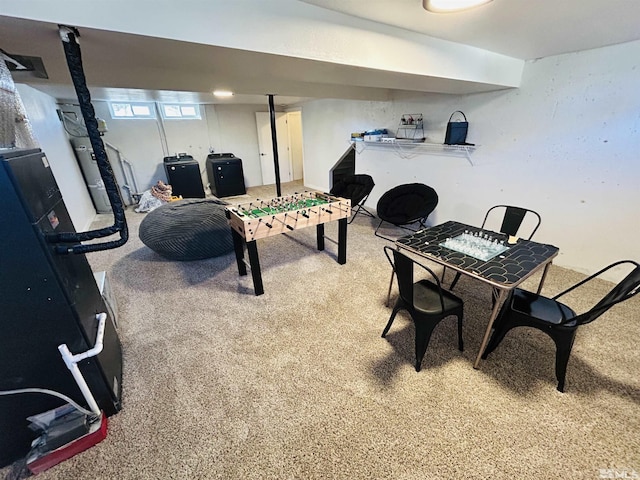 rec room featuring carpet flooring