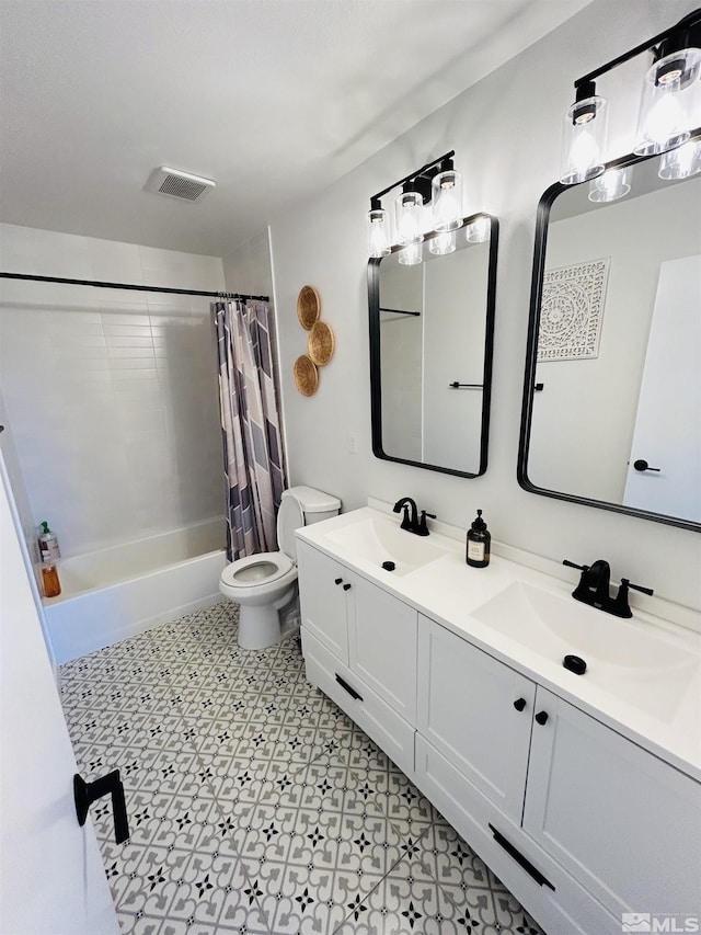 full bathroom with toilet, vanity, and shower / bath combination with curtain