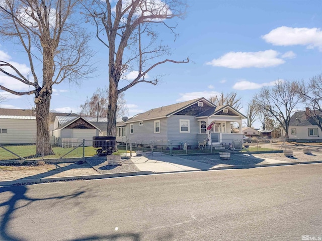 view of front of property with central AC unit and covered porch