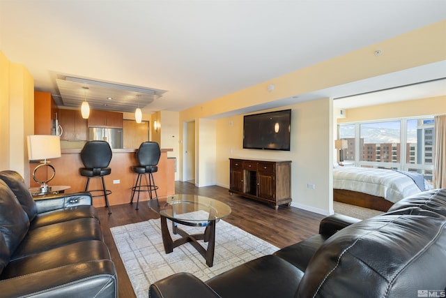 living room with hardwood / wood-style flooring