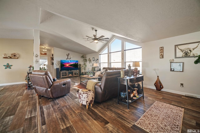 living room featuring ceiling fan, vaulted ceiling, dark hardwood / wood-style flooring, and a textured ceiling