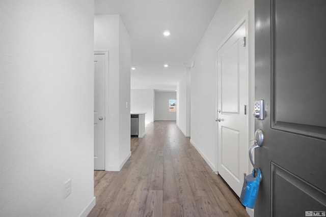 hall featuring light hardwood / wood-style floors