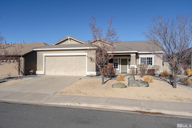 ranch-style house featuring a garage