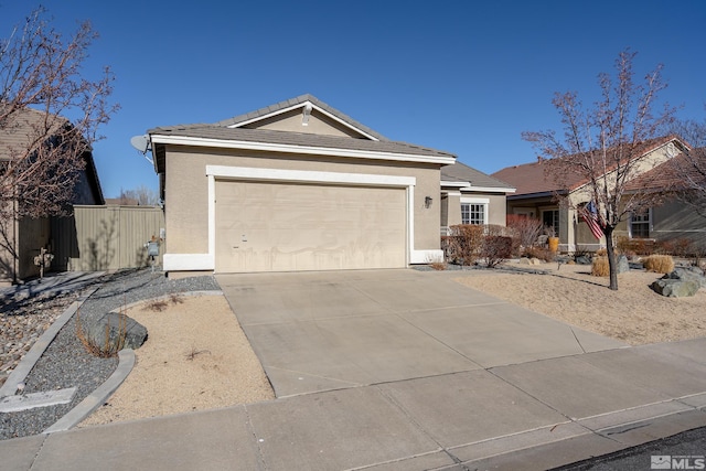 ranch-style home with a garage