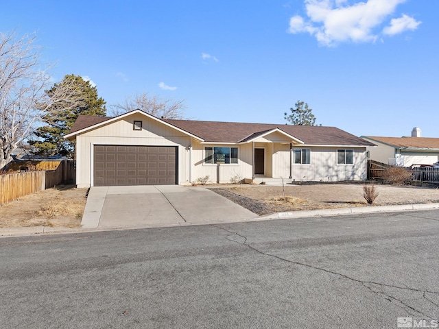 ranch-style home featuring a garage