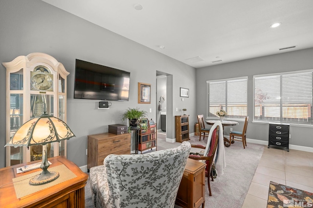 living room featuring light tile patterned floors