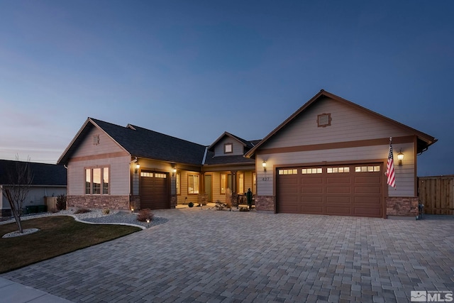 craftsman house with a garage