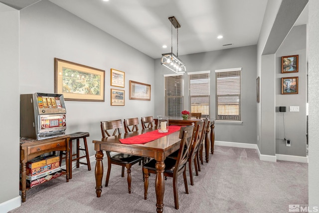 dining area with light carpet