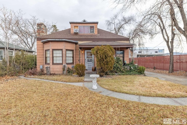 view of front facade with a front yard