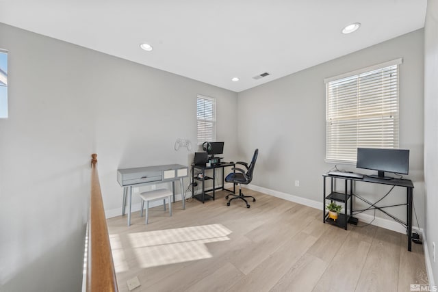 home office featuring light hardwood / wood-style floors