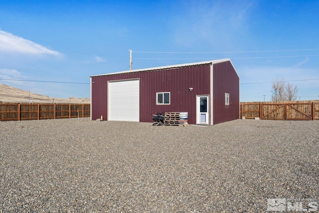 view of outdoor structure with a garage