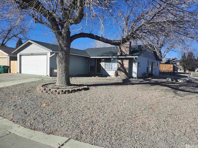 ranch-style home with a garage