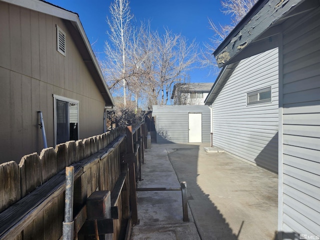 view of patio with a shed