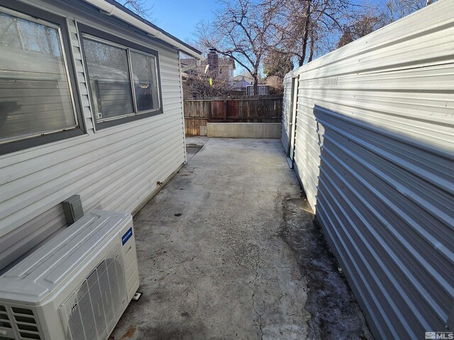 view of patio / terrace featuring ac unit