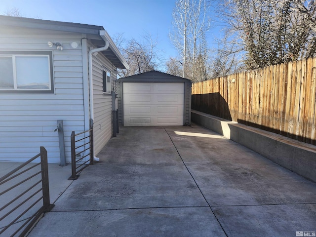 view of home's exterior featuring an outbuilding and a garage