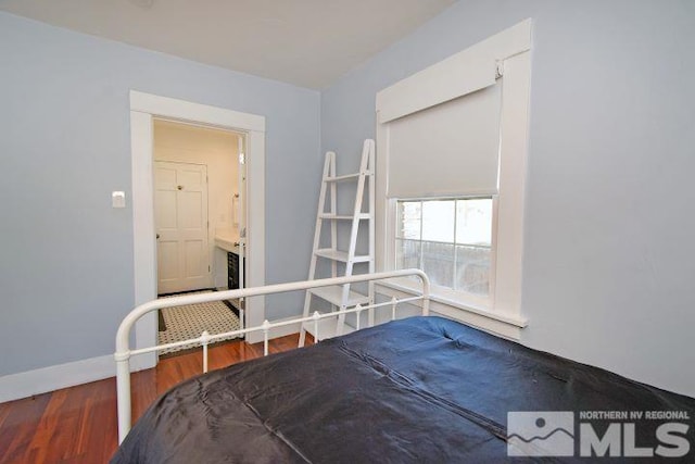 bedroom with wood-type flooring