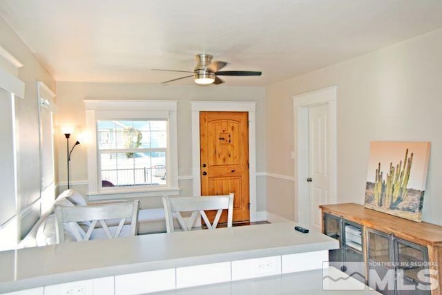 dining space featuring ceiling fan