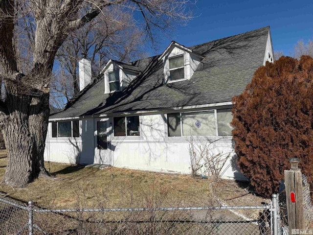 view of new england style home