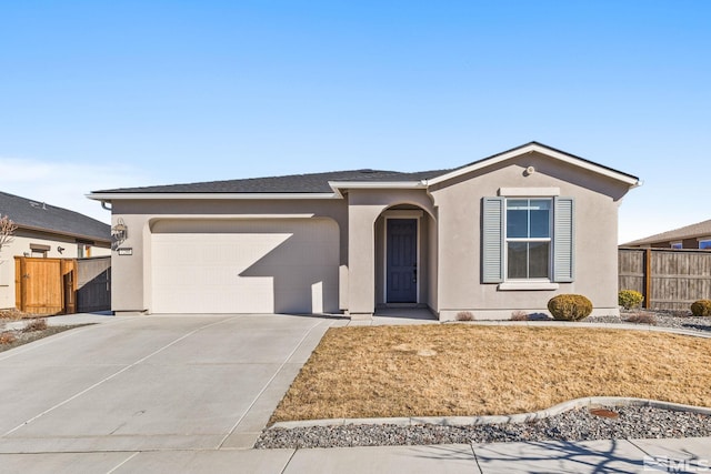 ranch-style house featuring a garage