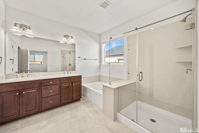 bathroom with vanity and plus walk in shower