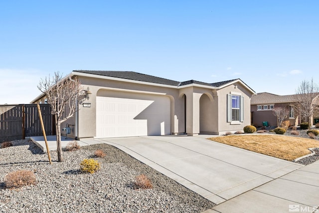 ranch-style house featuring a garage