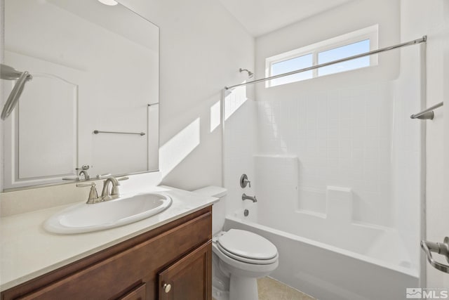 full bathroom featuring washtub / shower combination, vanity, and toilet