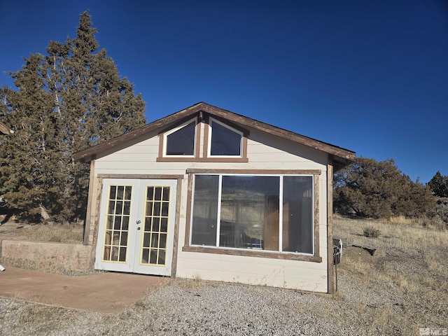 view of home's exterior with french doors