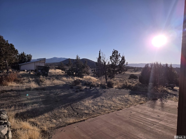 exterior space featuring a mountain view