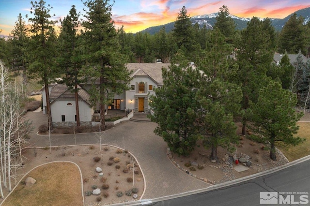 view of front of home with a mountain view