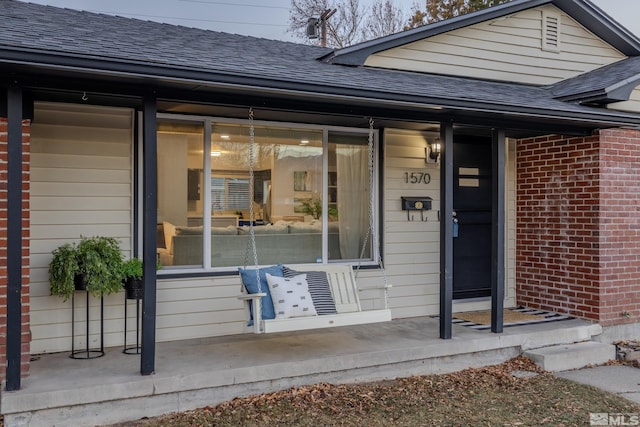 entrance to property with a porch