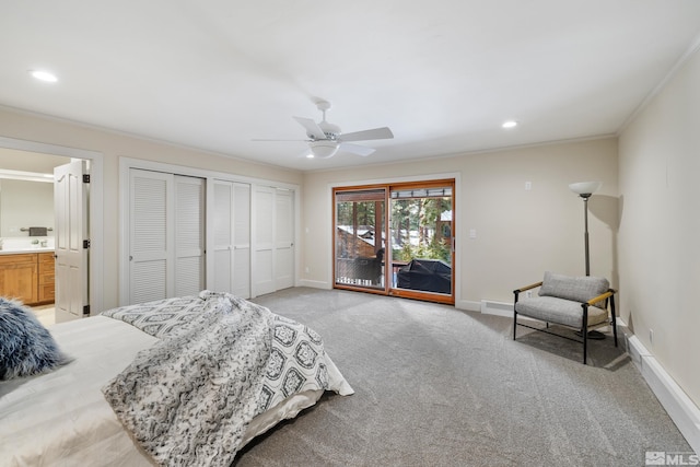 carpeted bedroom featuring ceiling fan, access to exterior, ensuite bathroom, and crown molding