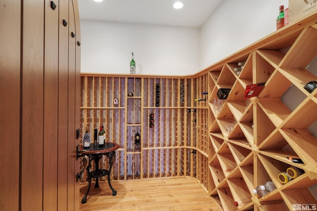 wine cellar featuring hardwood / wood-style floors