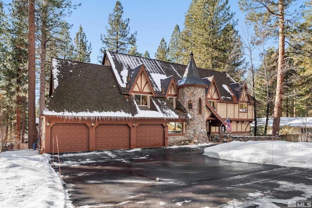 tudor house with a garage