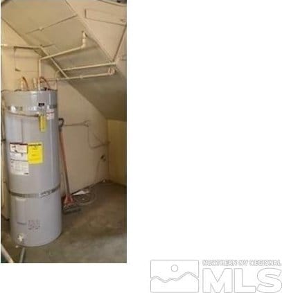 utility room featuring secured water heater