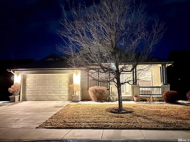 view of front of home with a garage