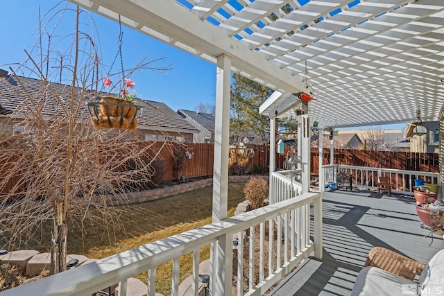 wooden deck featuring a pergola