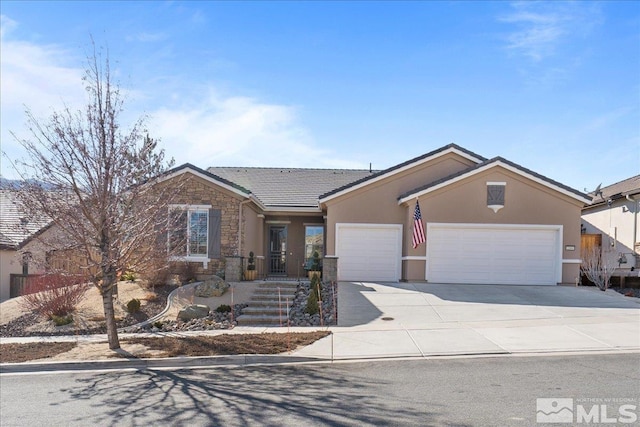 ranch-style home featuring a garage