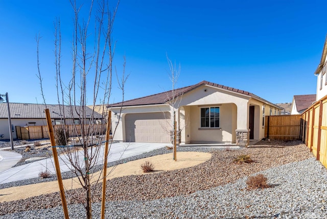 view of front of home with a garage