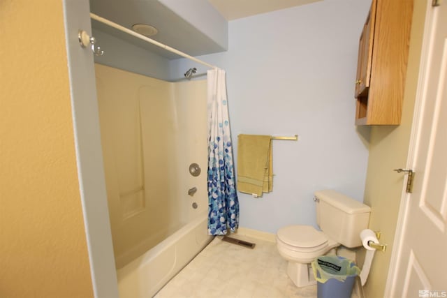 bathroom with toilet and shower / bath combination with curtain