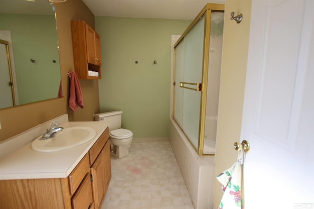 full bathroom featuring combined bath / shower with glass door, toilet, and vanity