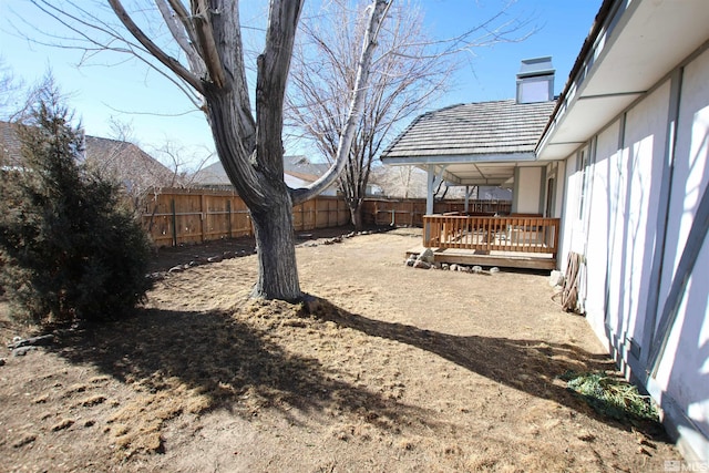 view of yard with a deck