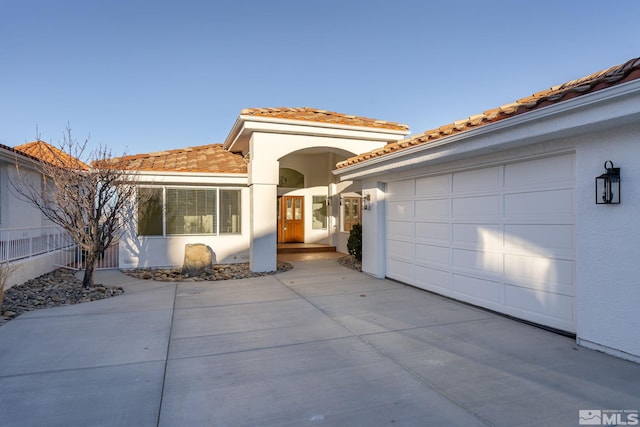 view of front of home featuring a garage