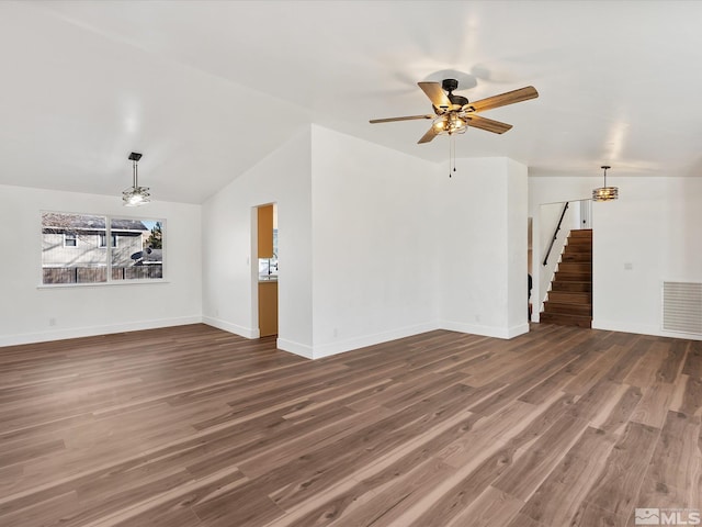 unfurnished living room with hardwood / wood-style flooring, vaulted ceiling, and ceiling fan