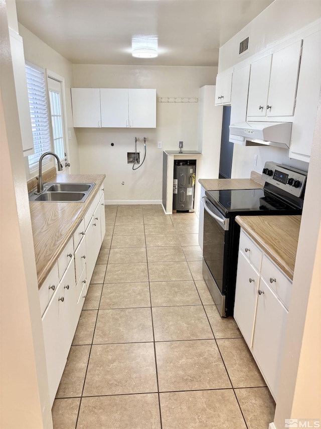 kitchen with sink, white cabinetry, and stainless steel electric range