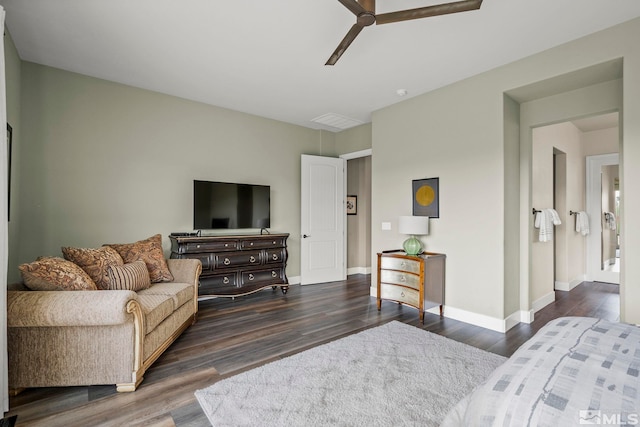 living room with dark wood-type flooring and ceiling fan