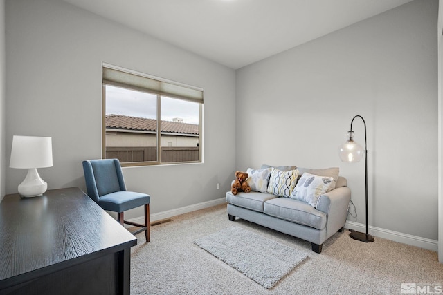 home office with carpet flooring