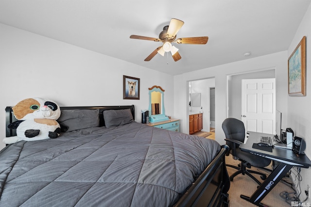 bedroom featuring ensuite bath and ceiling fan